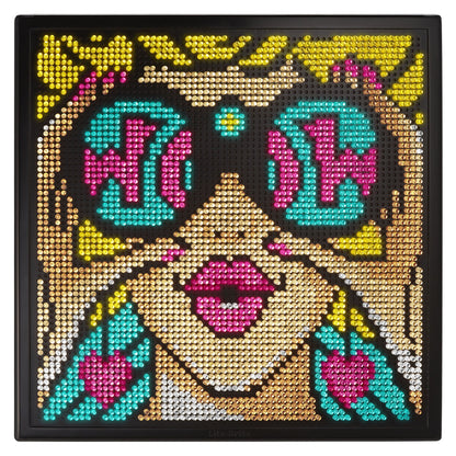 Lite-Brite Wall Art POP WOW illuminated display with colorful pegs in yellow, magenta, cyan, gold, and white forming retro pop art patterns on black pegboard