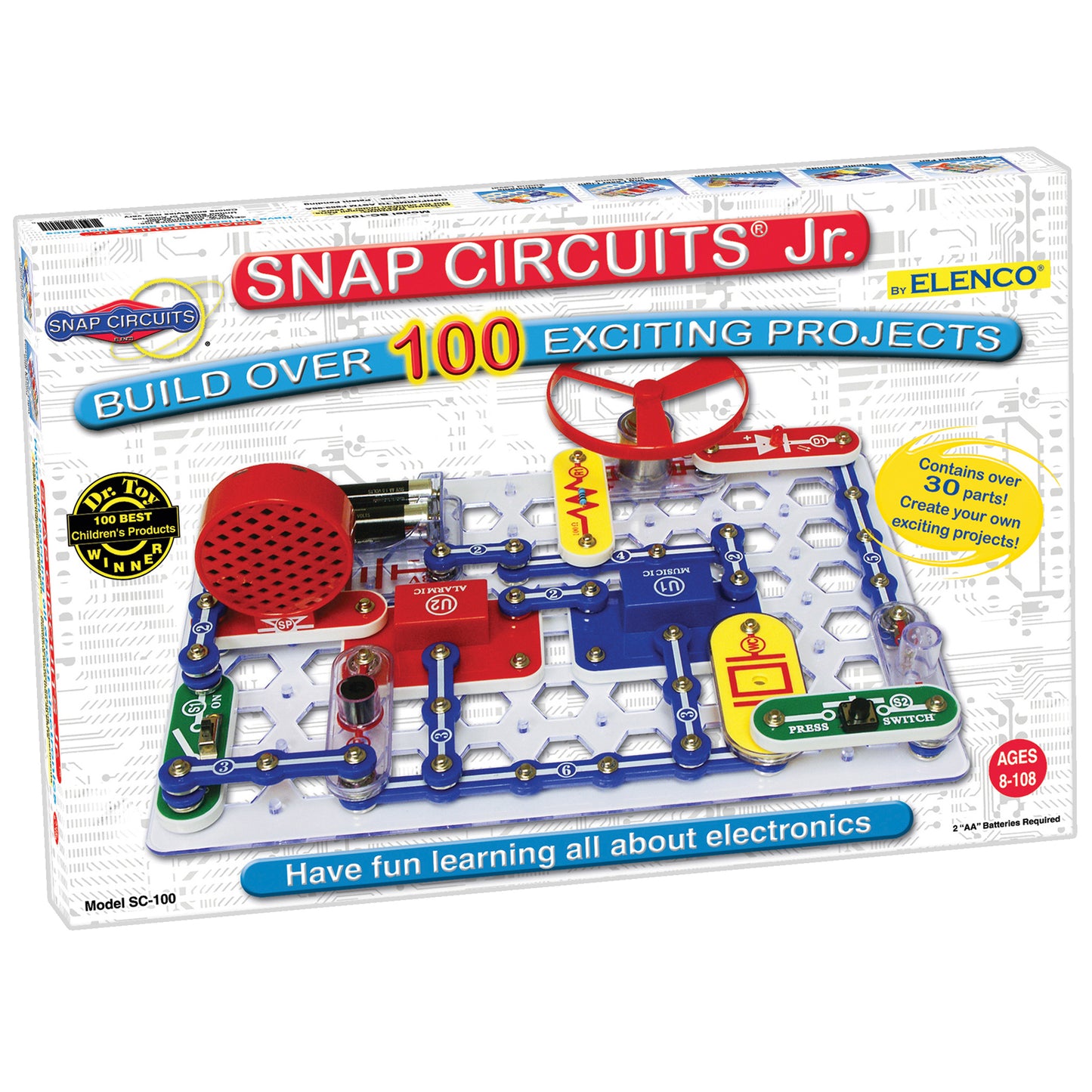 Snap Circuits Jr. electronic building set with red and blue snap-together components, battery pack, motor, and red propeller on white base grid