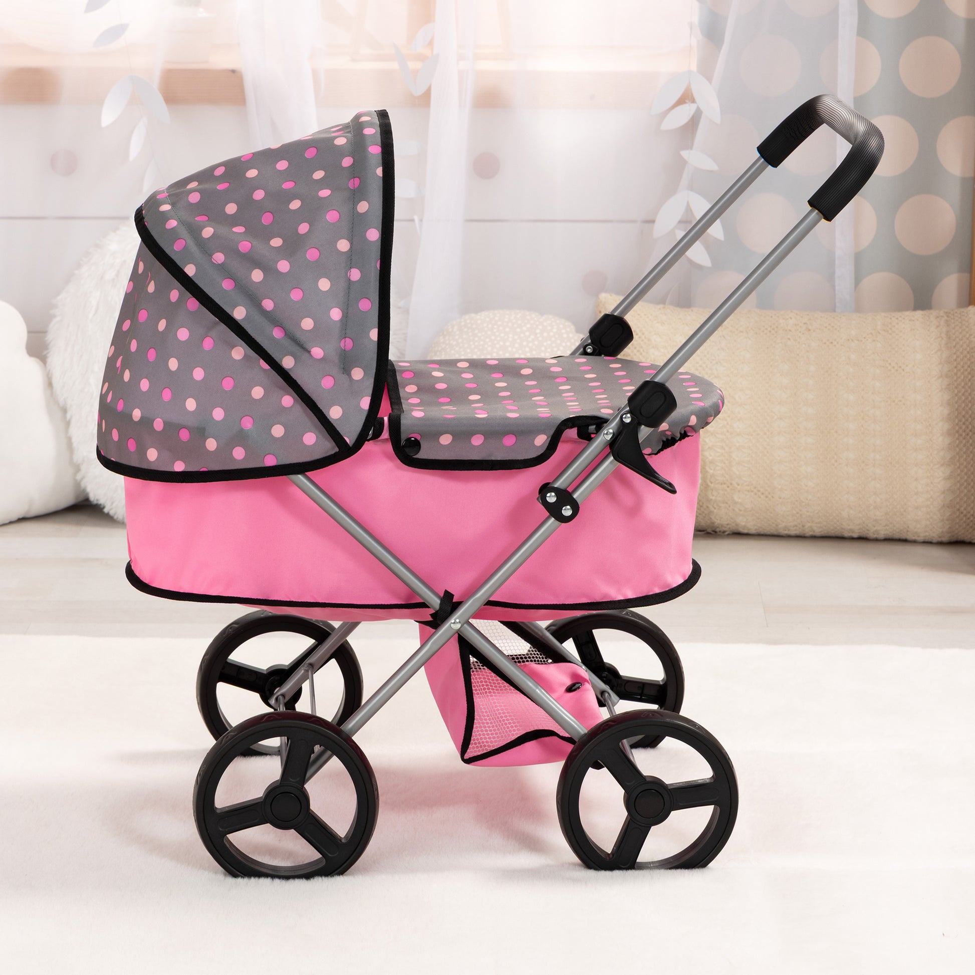 Bayer Design pink and grey polka dot doll pram with adjustable handle and shopping basket