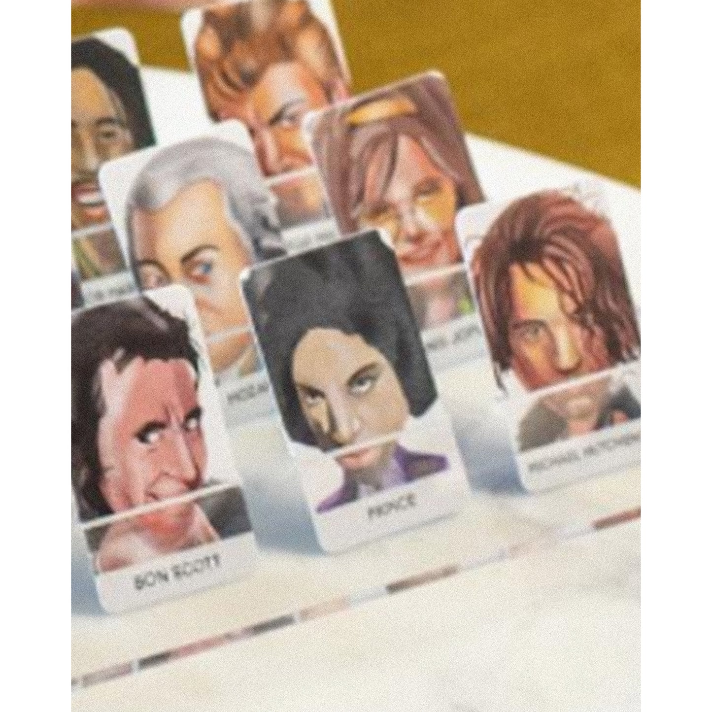 JOS Guess The Musician game with character cards featuring different musicians