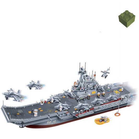 BanBao World Defense Marine Flag Ship building set with gray aircraft carrier, fighter jets, helicopters, support vessels, minifigures, and green brick piece di