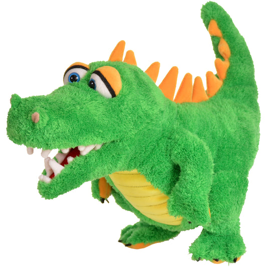 Green plush alligator hand puppet with orange spikes along back, yellow belly, blue eyes with orange markings, and open mouth showing white teeth