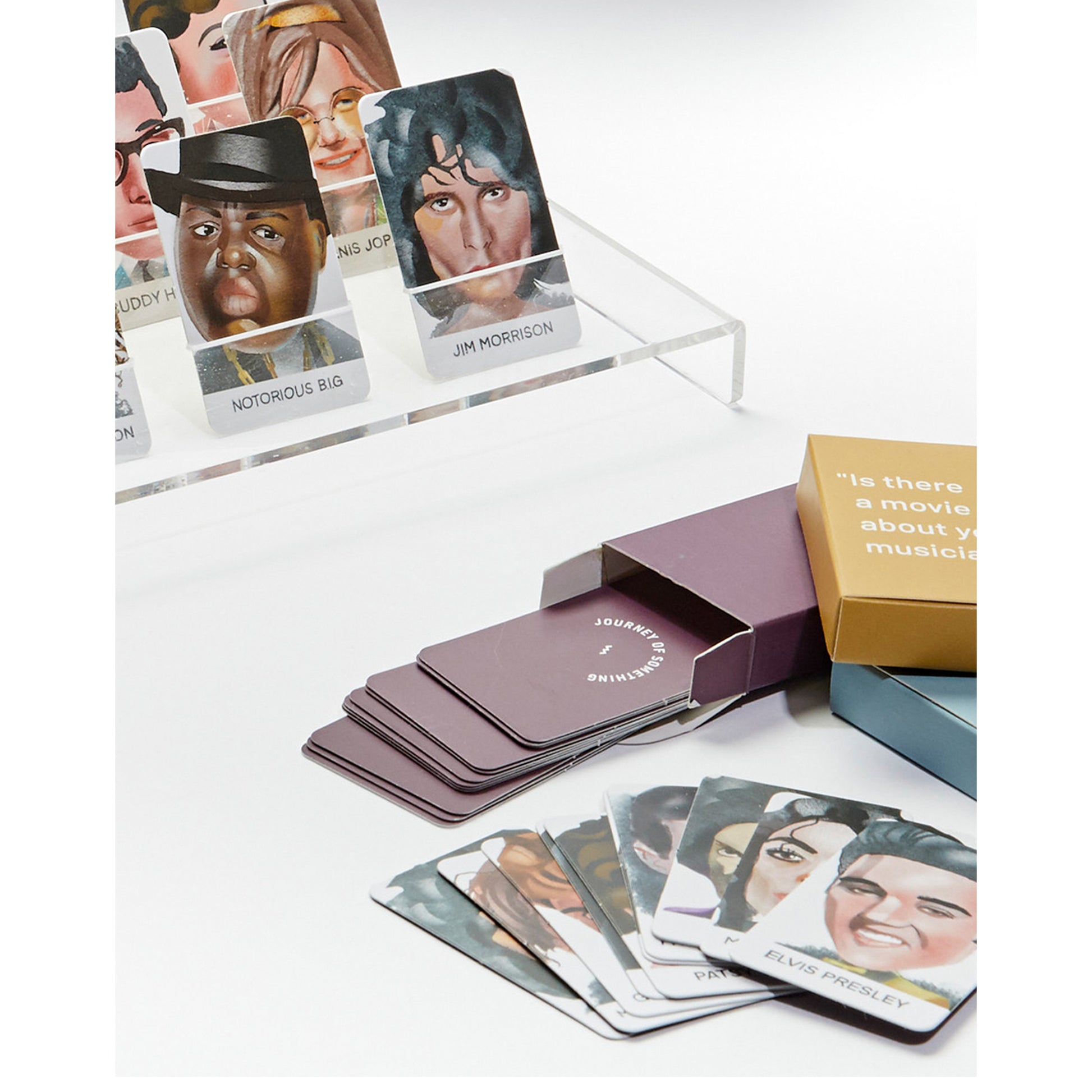 JOS: Guess The Musician card game with portrait cards and storage box