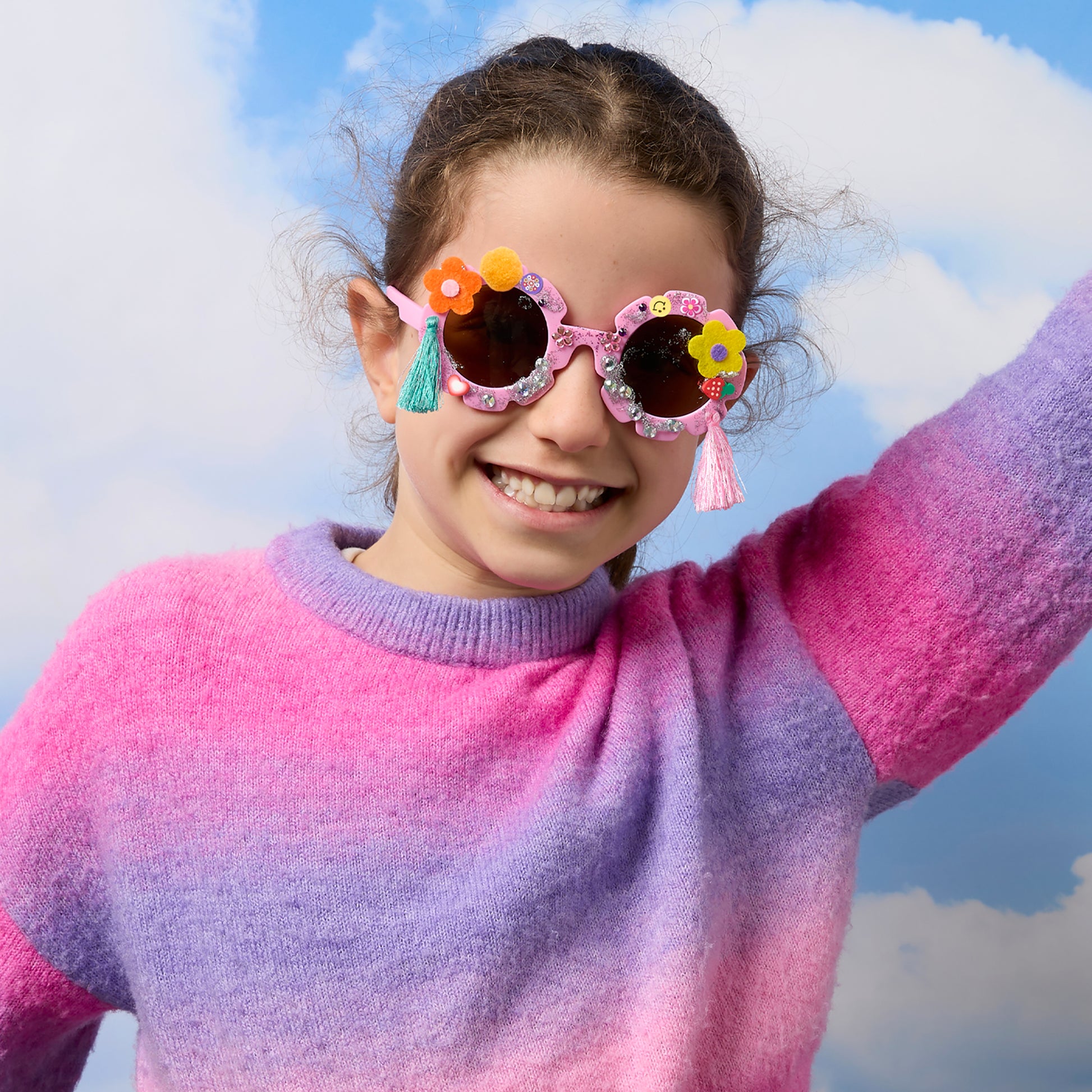 JOS Decorate Your Own Sunglasses in pink with colorful flower decorations and tassels