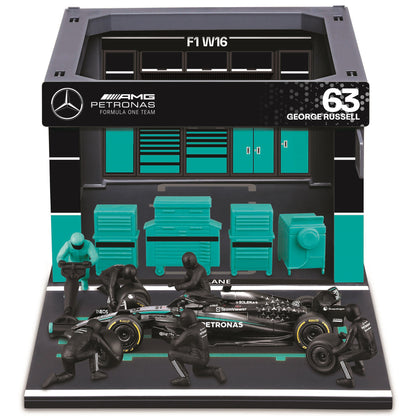 Bburago Pit Pass Playset with 2025 Mercedes W16 race car, turquoise and black pit garage, and six pit crew figures