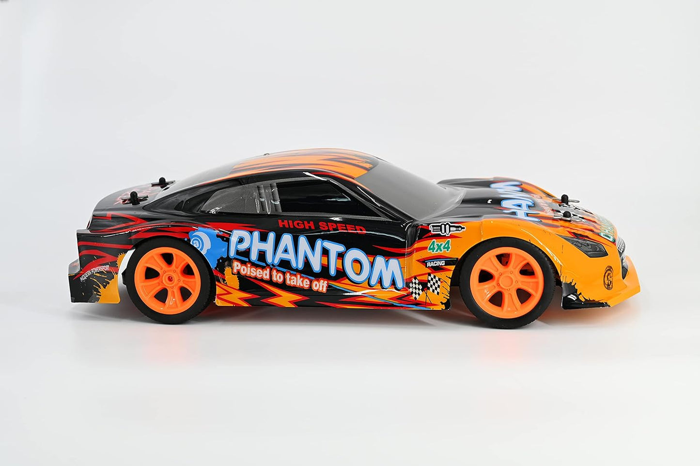 Remote control racing car with black and orange body, orange wheels, and "Phantom" graphics on white background