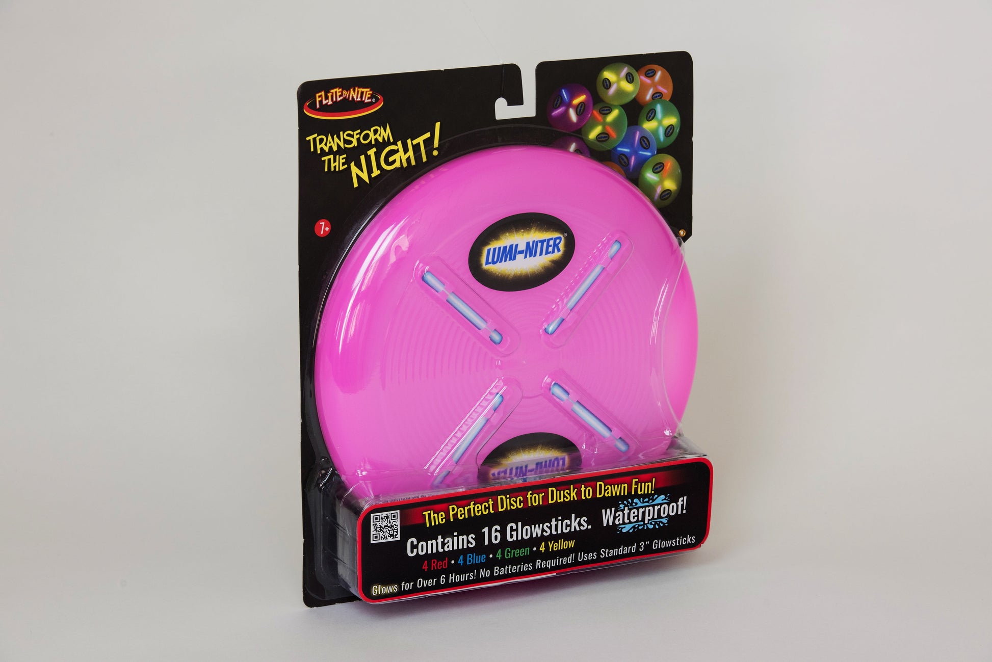 Lumi-niter Glow Disc Kit in bright pink with 16 glow sticks, shown in packaging that reads 'Transform the Night' and 'Contains 16 Glowsticks: 4 Red, 4 Green, 4