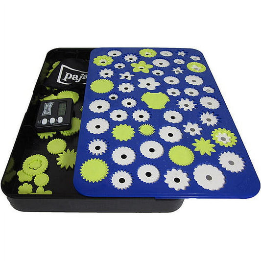 Pajaggle board game with blue board featuring lime yellow and white gear-shaped pieces, showing open box with electronic timer and game pieces