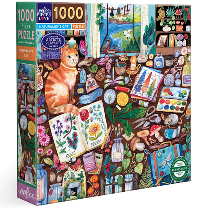Naturalist's Cat 1000 piece puzzle by eeBoo featuring an orange cat surrounded by art supplies, flowers, and nature i...