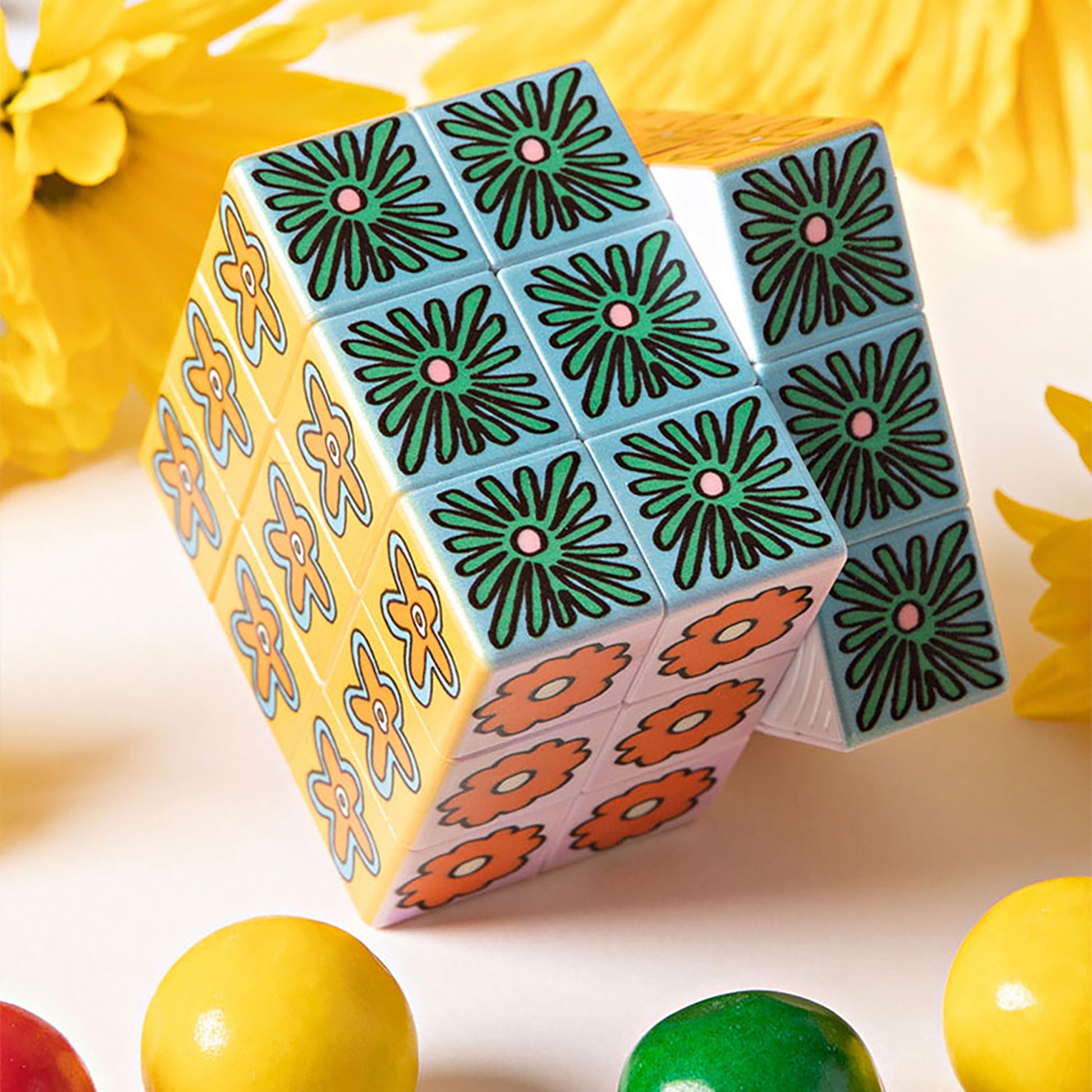 JOS Art Cube Flower Pop with colorful floral designs and yellow patterns