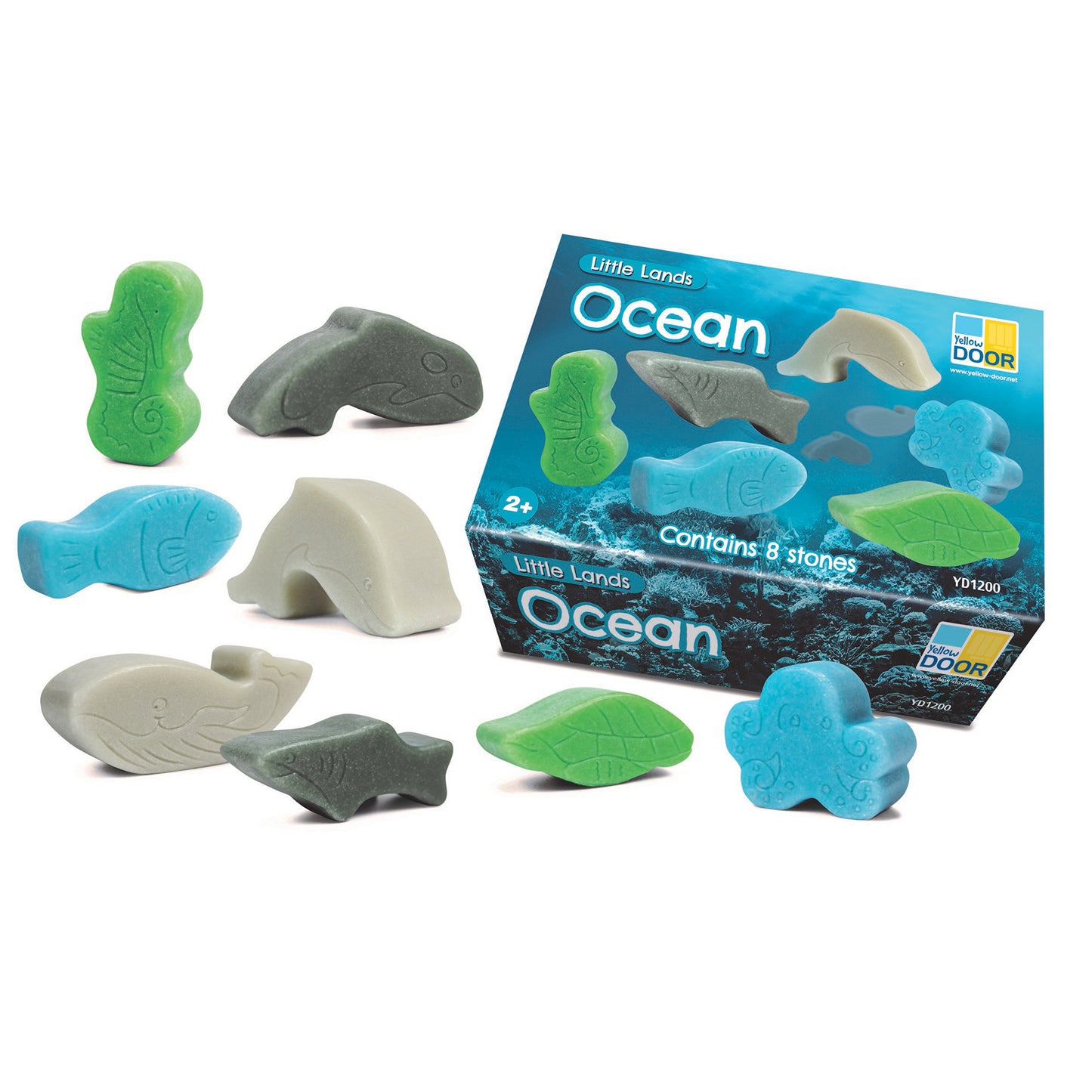 Little Lands Ocean set with 8 textured stone figures including whales, fish, sea turtle, and coral in green, blue, gray, and cream colors, shown with packaging