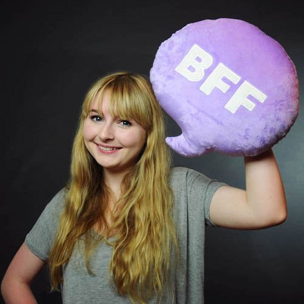 Child on model holding large purple plush pillow with "BFF" text, modeled by a child wearing gray t-shirt