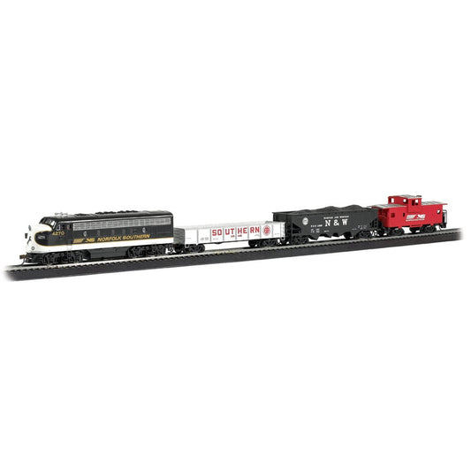 Bachmann Thoroughbred HO scale train set with black Norfolk Southern locomotive, white Southern boxcar, and red N&W caboose on black track against white backgro