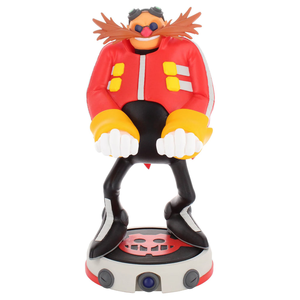Dr. Eggman character figure with orange head, brown spiky hair, blue eyes, red jacket with yellow buttons, black legs with yellow shoes, white gloved hands, and