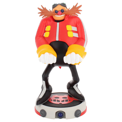Dr. Eggman character figure with orange head, brown spiky hair, blue eyes, red jacket with yellow buttons, black legs with yellow shoes, white gloved hands, and