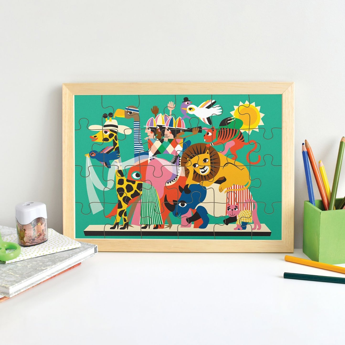 JOS 24 Piece Puzzle - Animal Carnival with colorful animals and performers on turquoise background