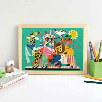 JOS 24 Piece Puzzle - Animal Carnival with colorful animals and performers on turquoise background