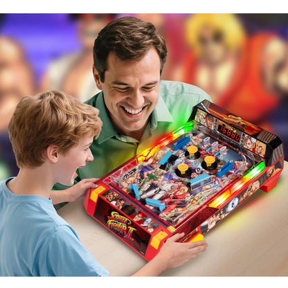 Street Fighter II Arcade Pinball Premium Series toy with red body and yellow accents, adult and child playing together