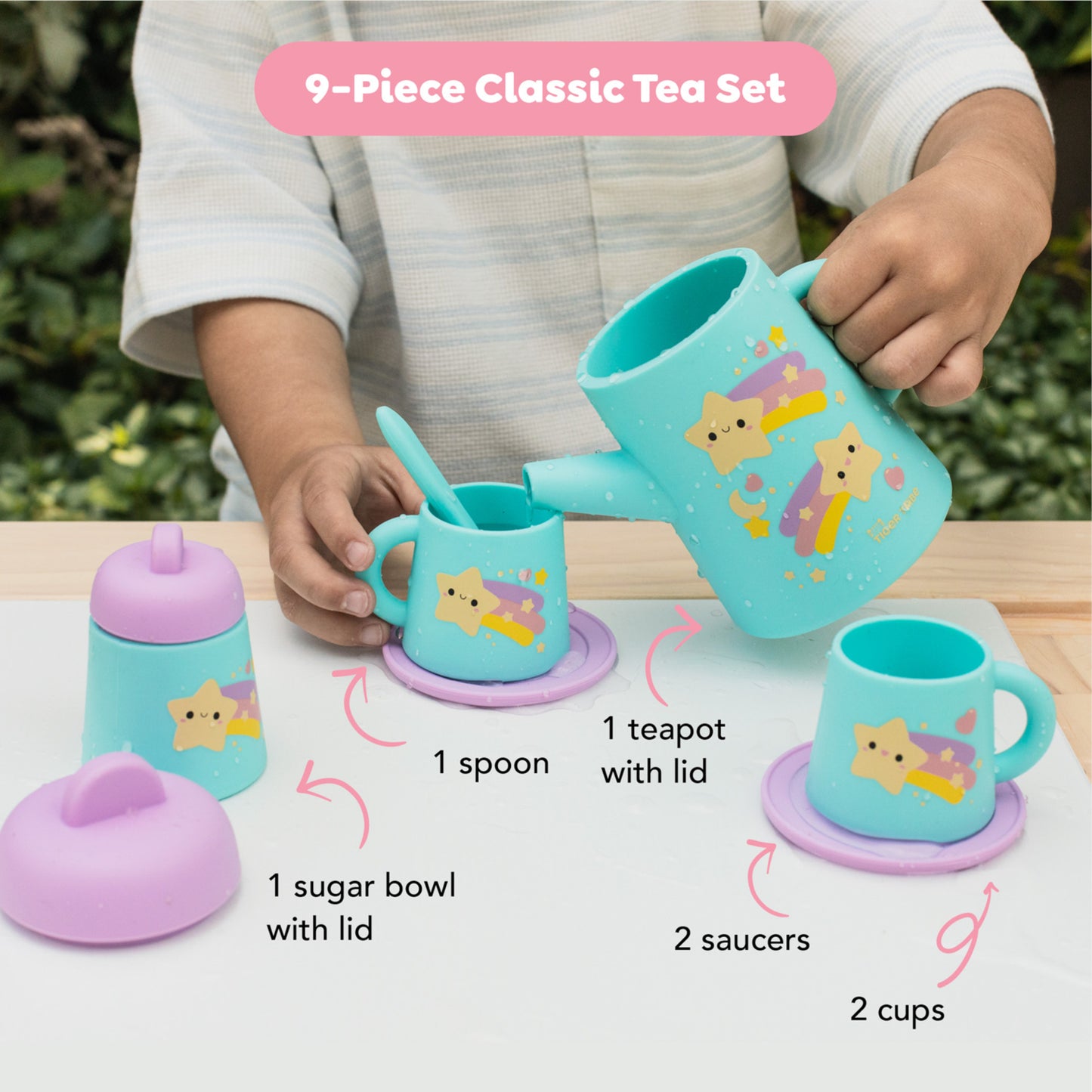 Tiger Tribe 9-piece silicone tea set in turquoise and purple with star designs, includes teapot, cups, saucers, sugar...