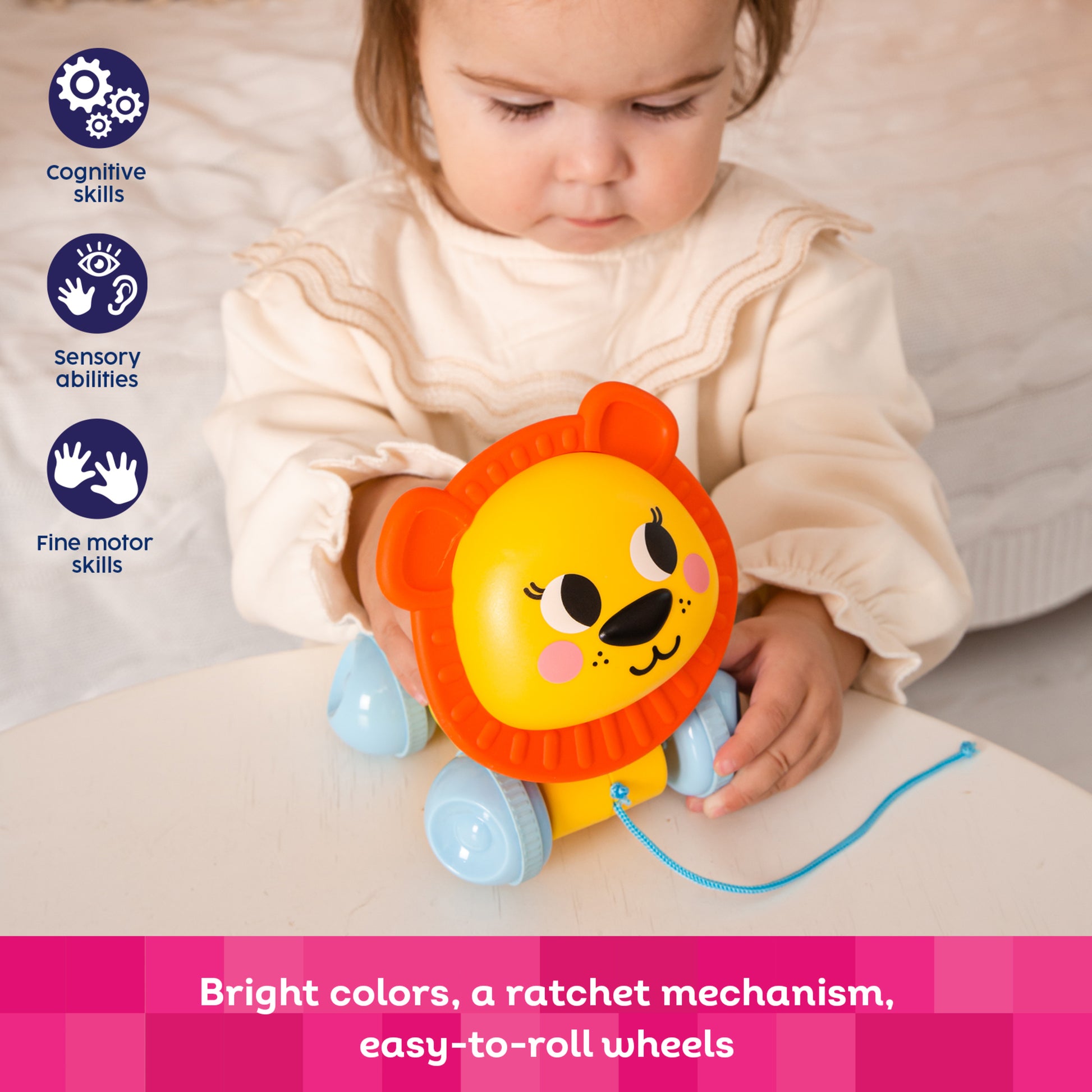 Kids Hits Push & Pull Lion toy in yellow and orange with blue wheels, featuring rotating head and ratchet mechanism