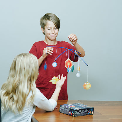 4M Solar System Model Kit - DIY planet mobile with painted spheres hanging from blue frame