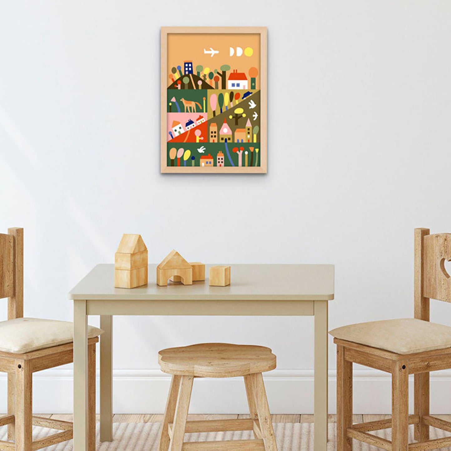 JOS Paint By Numbers Outside The City framed artwork on white wall above wooden table