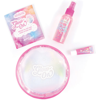 Glimmer & Glow beauty set with pink spray mist, sheet mask, lip gloss, and clear case