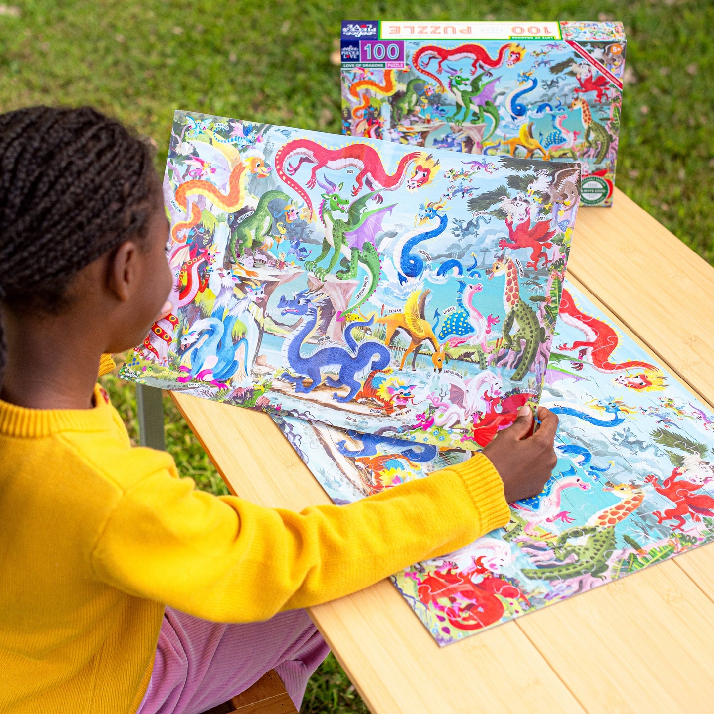 100 Piece Puzzle: Love of Dragons featuring colorful dragons and fantasy creatures in vibrant colors