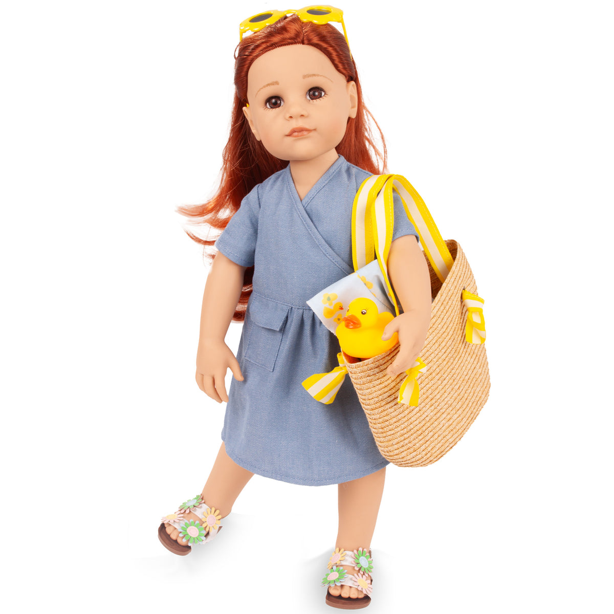 Gotz Hannah Little Duck 19.5" doll with red hair, blue wrap dress, straw tote bag, and yellow duck accessory