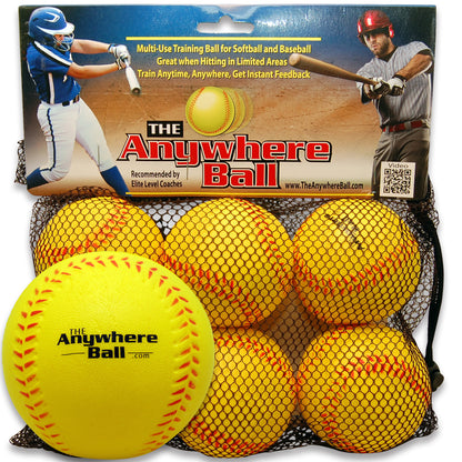 The Anywhere Ball 6-pack training set with yellow foam softballs and red stitching in mesh bag, showing packaging with softball and baseball players