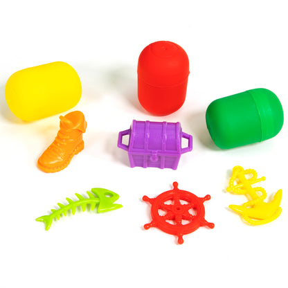 Colorful beach and ocean toy set with yellow bucket, red capsule, green cylinder, purple chest, orange seahorse, lime...