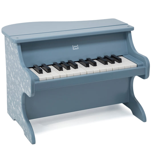 Blue wooden toy piano with white and black keys, floral pattern on side panel, and curved legs
