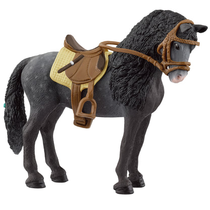 Black horse figurine with textured coat, wearing brown leather saddle with yellow pad and matching bridle with bit