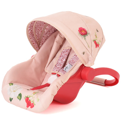 Roma RHS Flora Doll Car Seat with pink floral design, hood, and red harness