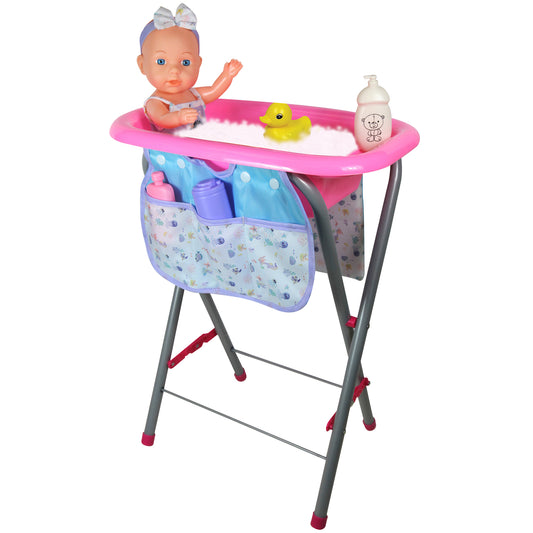 Baby doll with blonde hair and bow sitting in pink bath tub on stand with storage pockets, includes yellow duck, bottle, and bath accessories