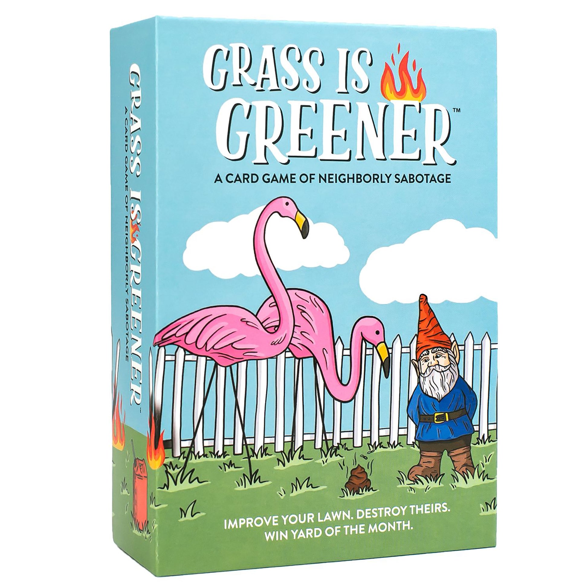 Grass Is Greener card game box featuring pink flamingos and a garden gnome with white picket fence, blue sky background