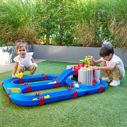 AquaPlay Harbor water toy set with blue tracks and red posts on artificial grass