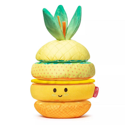 Stacked soft plush pineapple toy with yellow base, green leaves on top, and smiling face on model