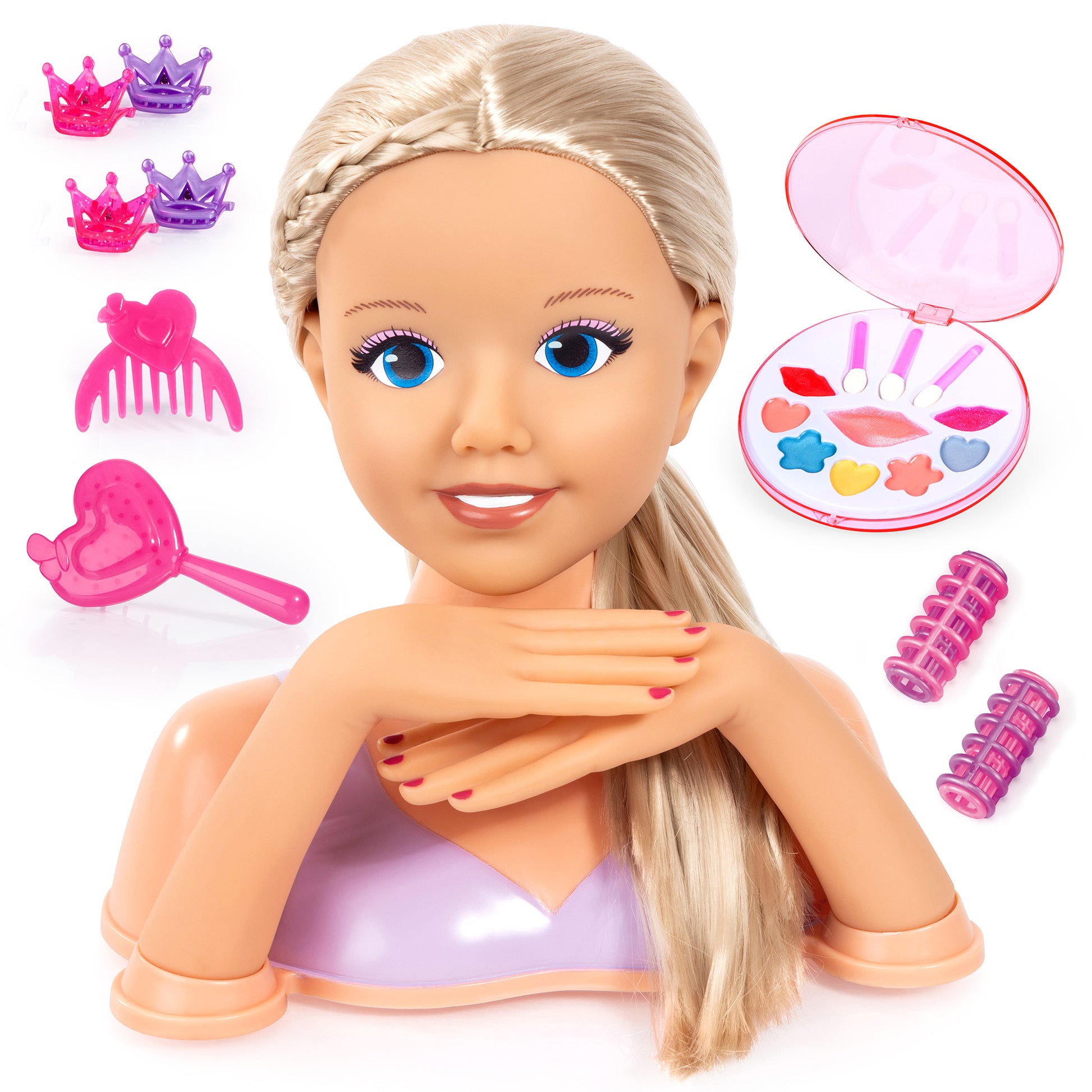 Styling head doll with blonde hair and blue eyes, shown with pink and purple crown accessories, hair comb, heart-shaped mirror compact with colorful makeup appl