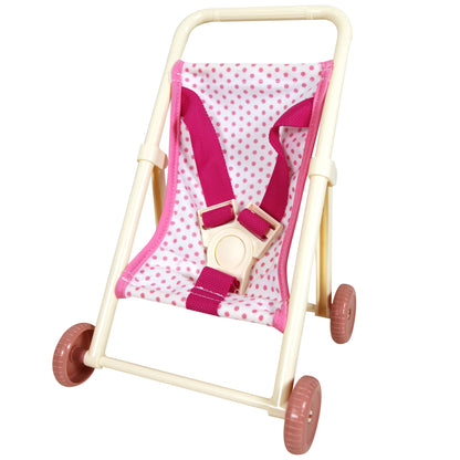 Pink and white polka dot baby doll pushchair with cream frame and mauve wheels
