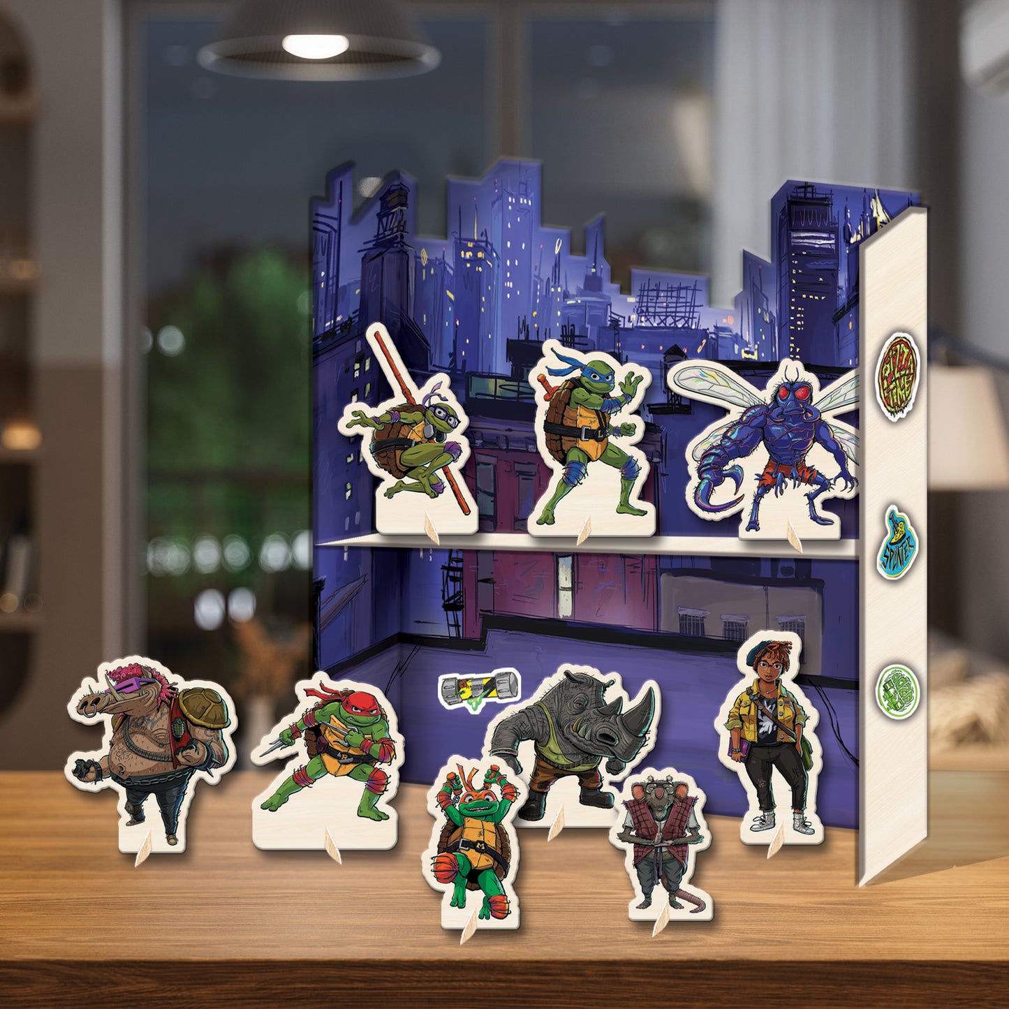 TMNT Deluxe Activity Set with colorful character standees and purple cityscape backdrop