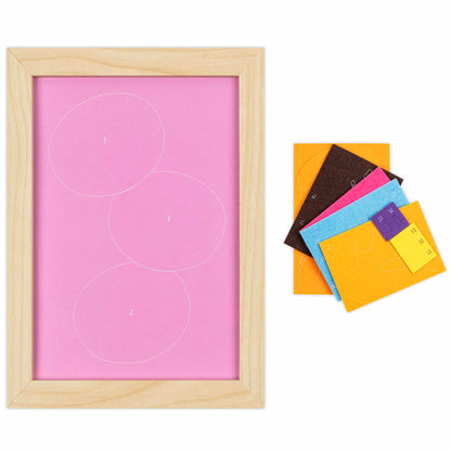 Felt Art Sweet Donuts craft kit with wooden frame, pink board, and colorful felt pieces