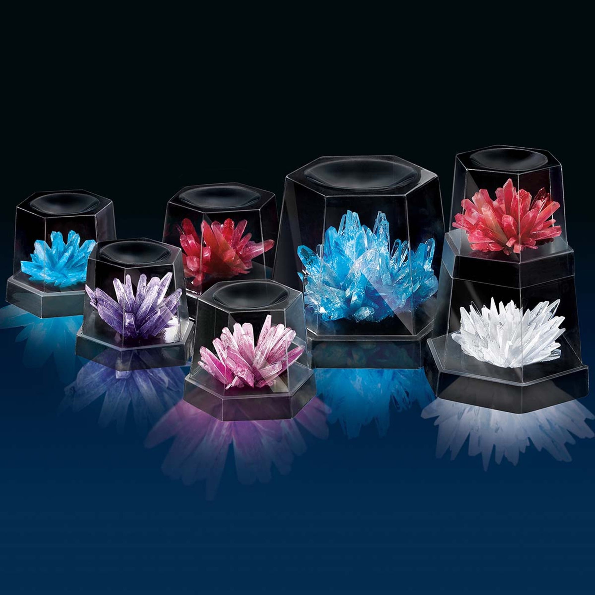 4M Crystal Growing Kit with 7 colorful crystals in blue, purple, pink, red and white displayed in black hexagonal cases