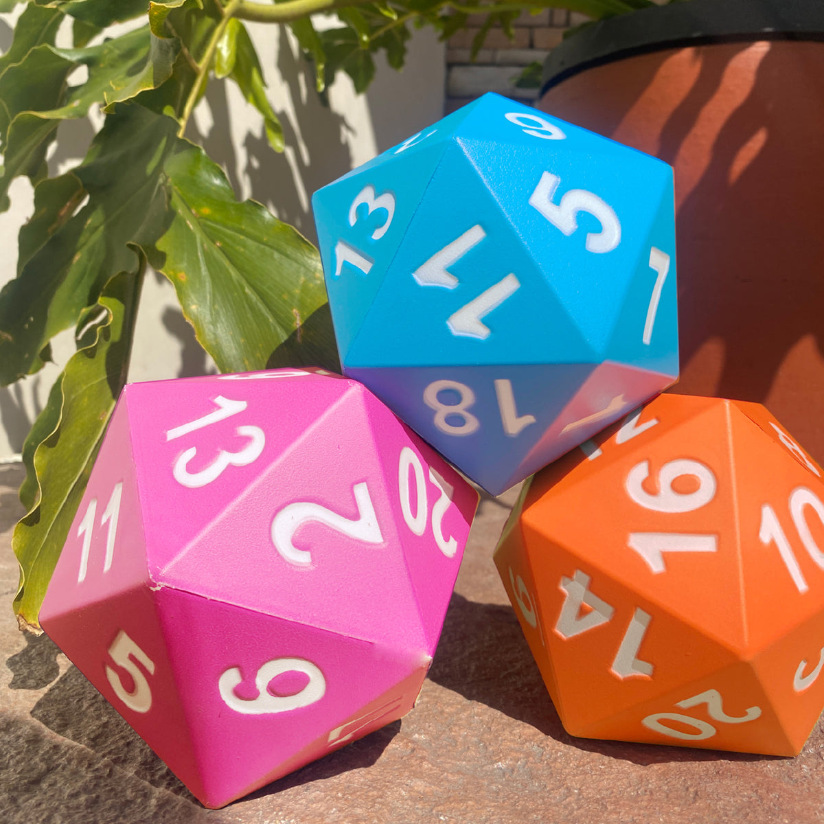 KESS Giant D20 Foam Dice set in blue, pink, and orange with white numbers for tabletop RPG games