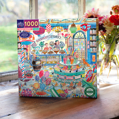 Piece&Love Sweet Shoppe 1000 Piece Puzzle with colorful candy shop illustration and artist playlist on box