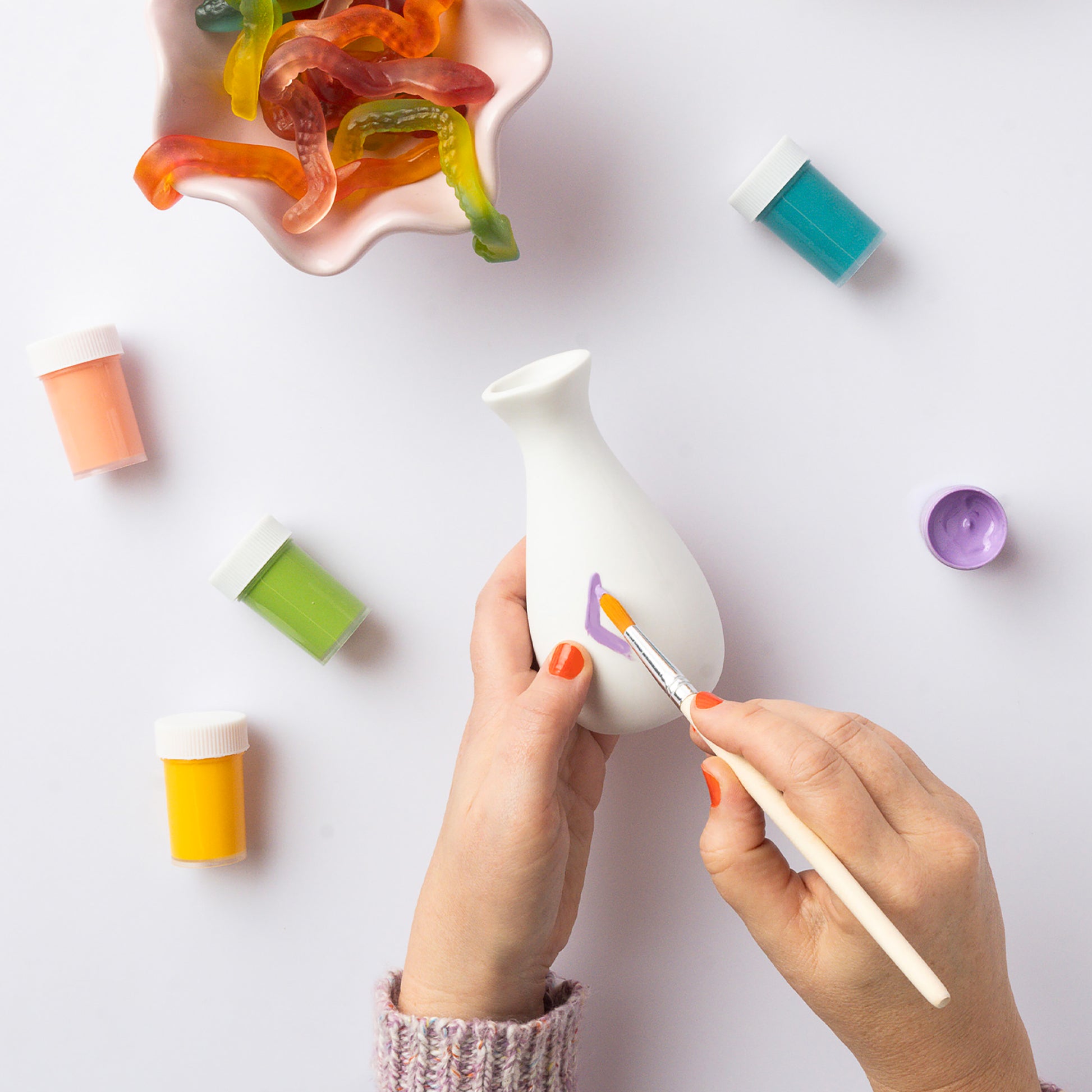 JOS Paint Your Own Vases craft kit with white vase, colorful paints, and brush