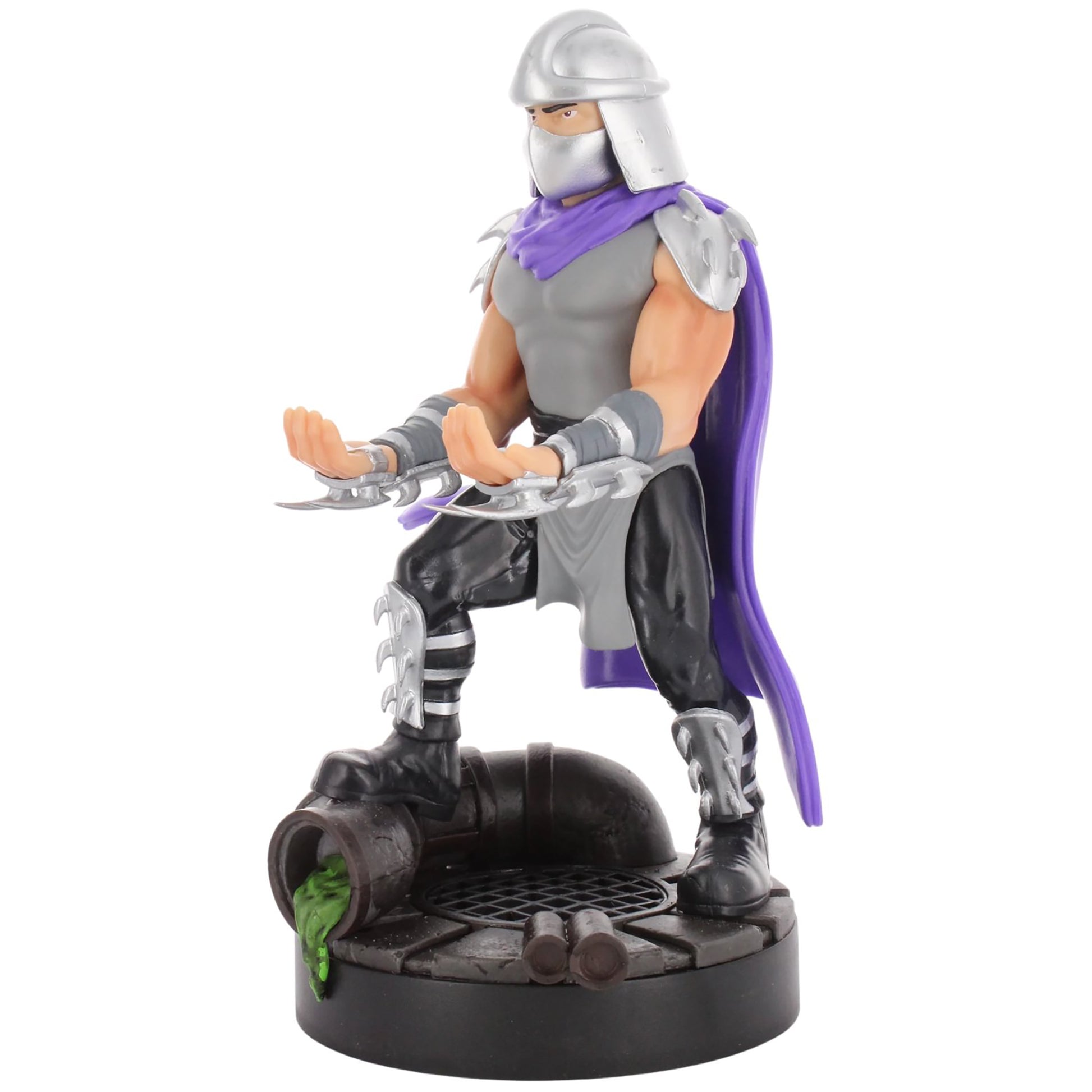 Shredder action figure with silver helmet, purple cape, gray and black armor, holding sai weapons, standing on dark base