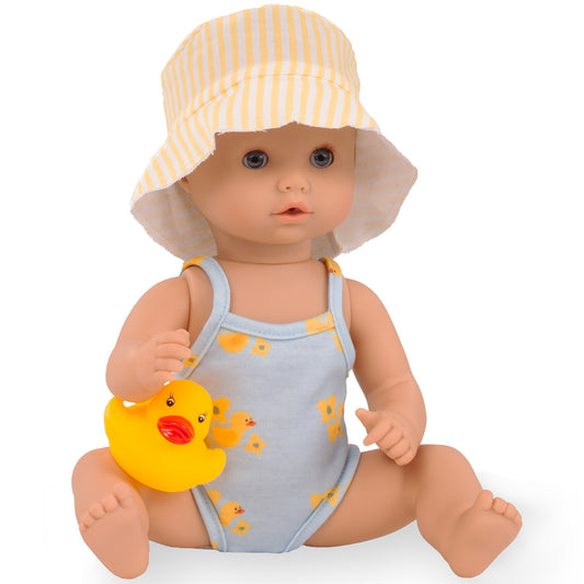 Gotz Sleepy Aquini baby doll in yellow striped hat and duck-print swimsuit holding yellow duck toy