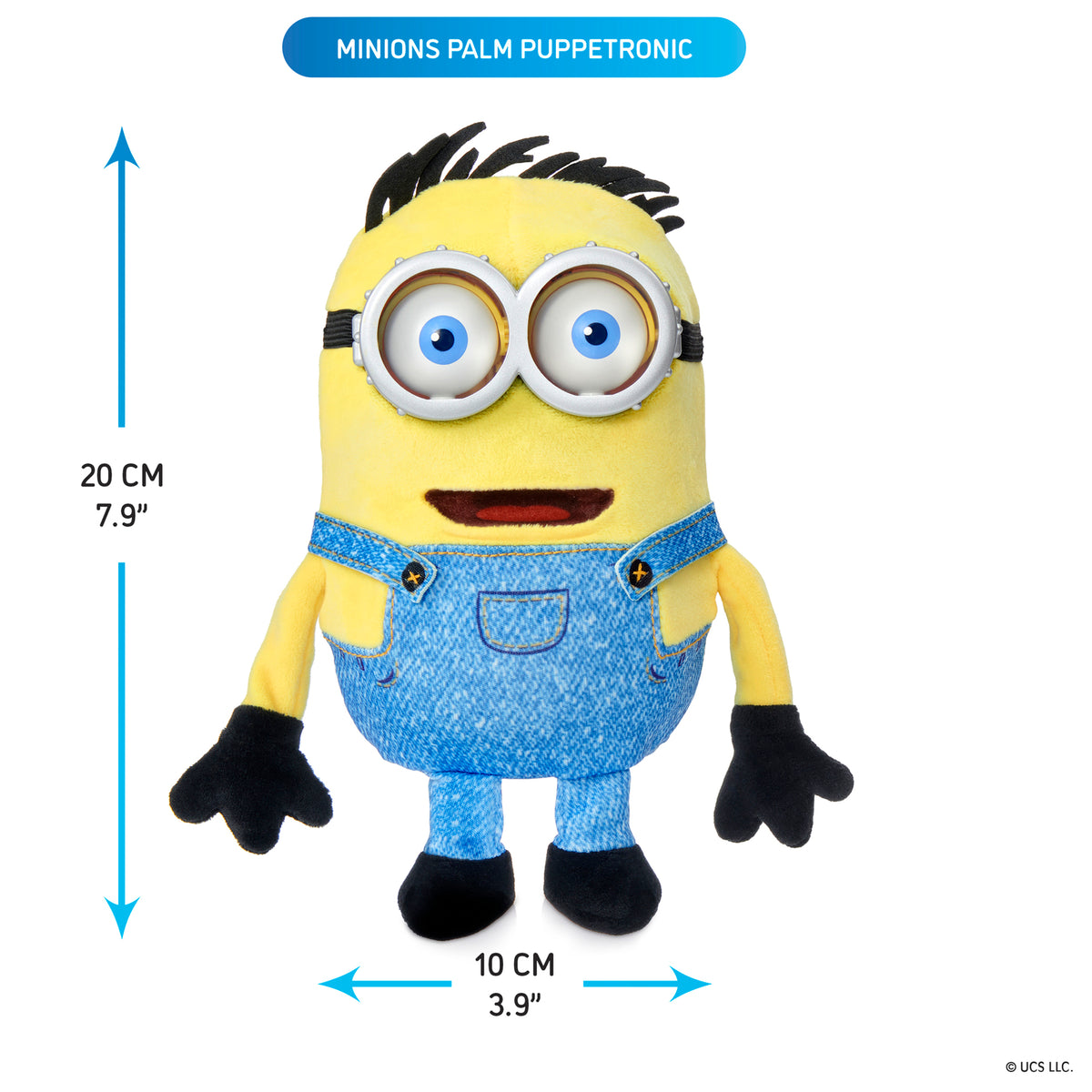 Minions Palm Puppetronic Henry interactive toy with yellow body, blue overalls, black spiky hair, and large expressiv...