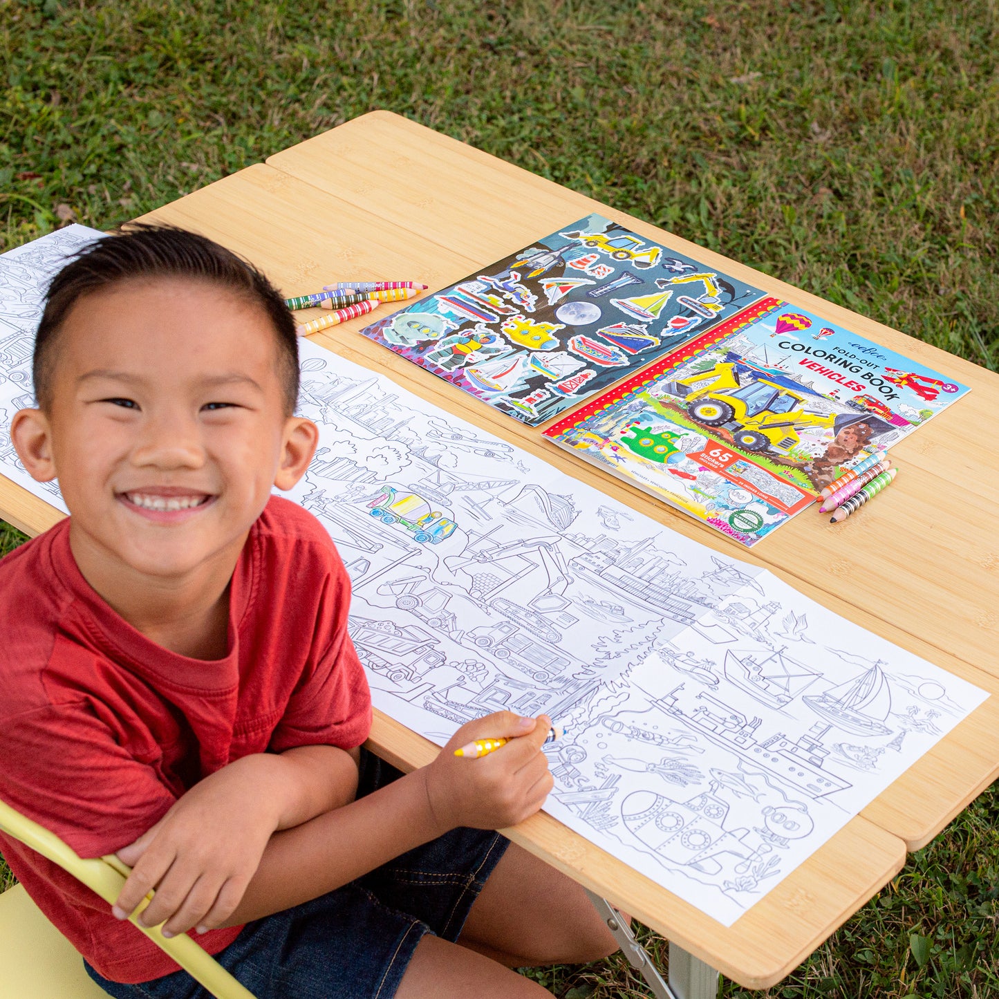 Fold-Out Coloring Book: Vehicles with pencils, featuring transportation designs